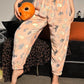Glow-in-the-Dark Flannel Pajama Pants: Spooky Halloween Ghost & Pumpkin Print