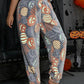 Glow-in-the-Dark Flannel Pajama Pants: Spooky Halloween Ghost & Pumpkin Print